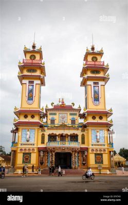 Cao Dai Temple in Tay Ninh: Unveiling a Fusion of Religious Symbolism and Architectural Splendor!